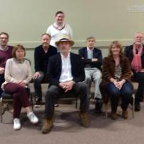 Tim Bradley with Paul Marc Davis, Janet Fielding, David Hankinson, Peter Davison, Peter Roy, Sarah Sutton and designer Roger Murray-Leach at 'Bedford Who Charity Con 6', October 2021